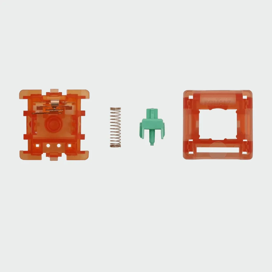 The inside of a C³Equalz tangerine 62g mechanical keyboard switch
